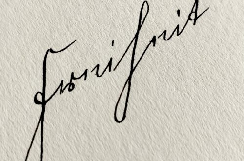 "Freiheit" geschrieben in Kurrentschrift von links unten nach rechts oben