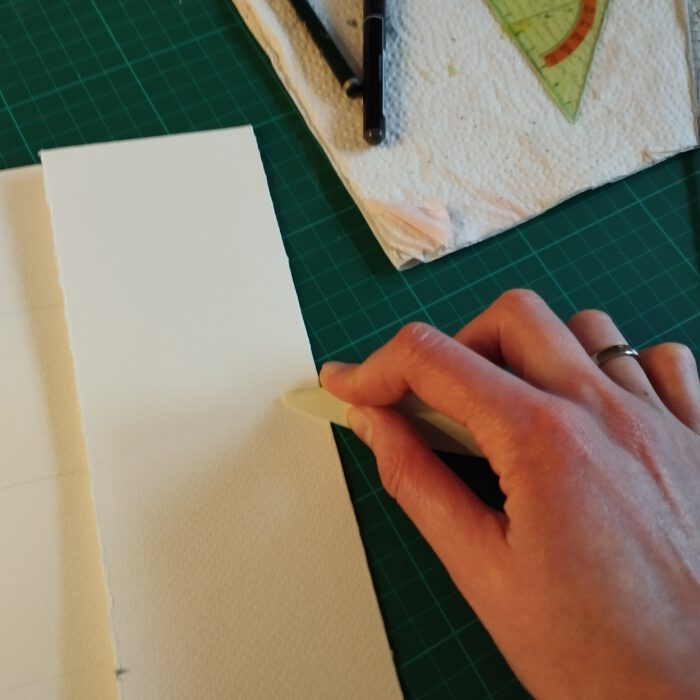 Falzen der Bildbeschriftungskarten